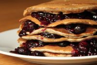 Cinnamon Oatmeal Pancakes with Cranberry‑Raspberry Compote