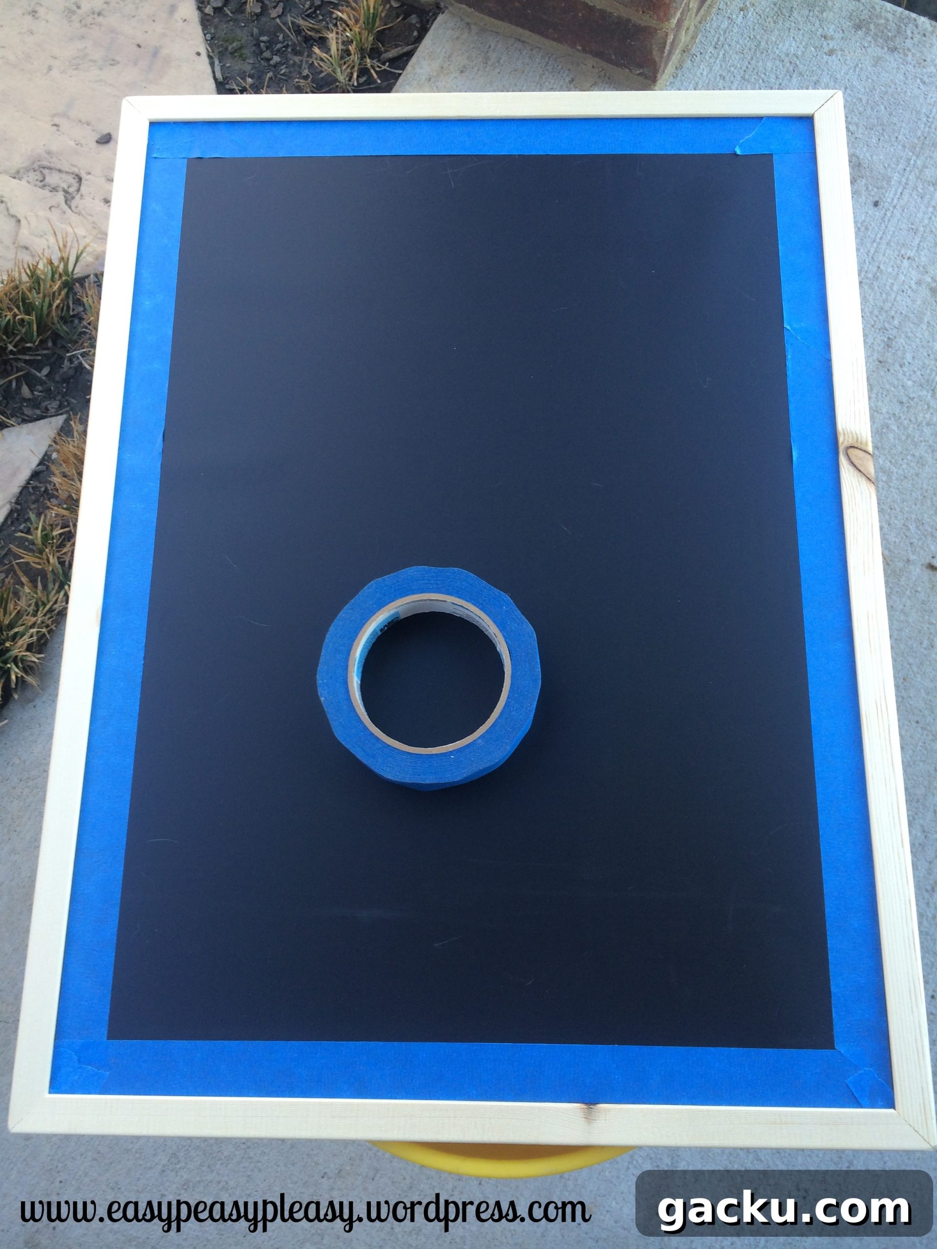 DIY Pregnancy Announcement Ideas: Feature Friday with Family & Friends 3 Using painters tape to paint chalkboard frame to tell people you are pregnant