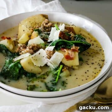 zuppa toscana on white plate.