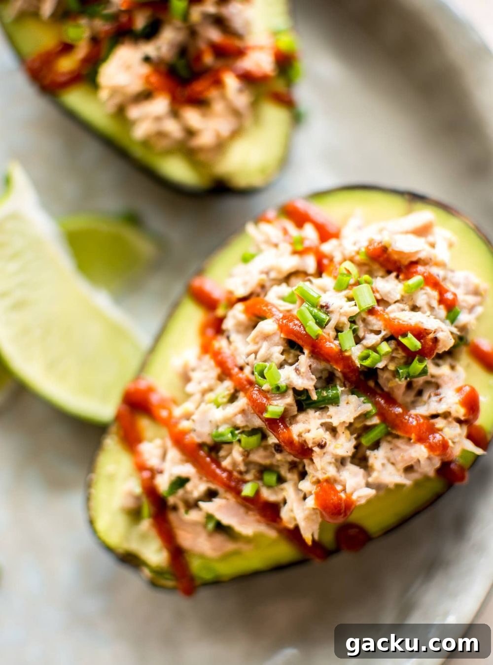 50+ Crowd-Pleasing Summer Recipes for Parties and Gatherings 44 spicy tuna stuffed avocado