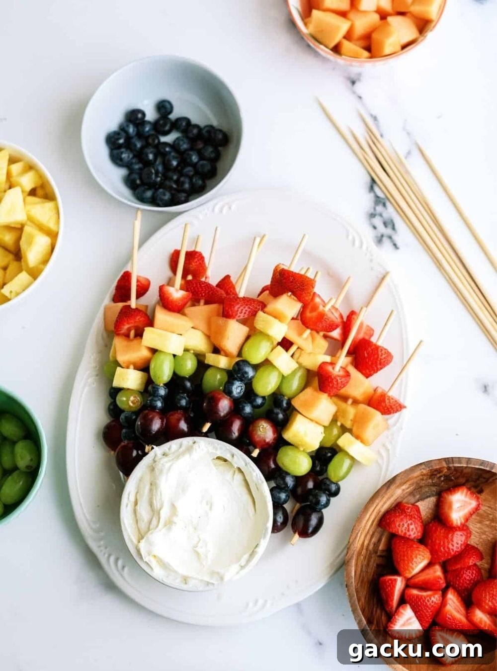 50+ Crowd-Pleasing Summer Recipes for Parties and Gatherings 47 rainbow fruit kabobs
