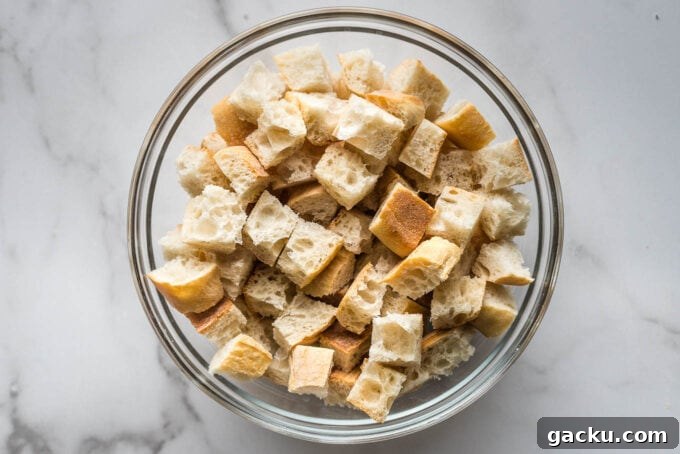Crispy Homemade Croutons Recipe for Salads & Soups 4 Bread cubes in a bowl.