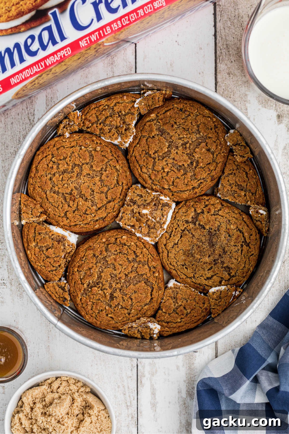 Oatmeal creme pie cookies lining a base of a pie dish.