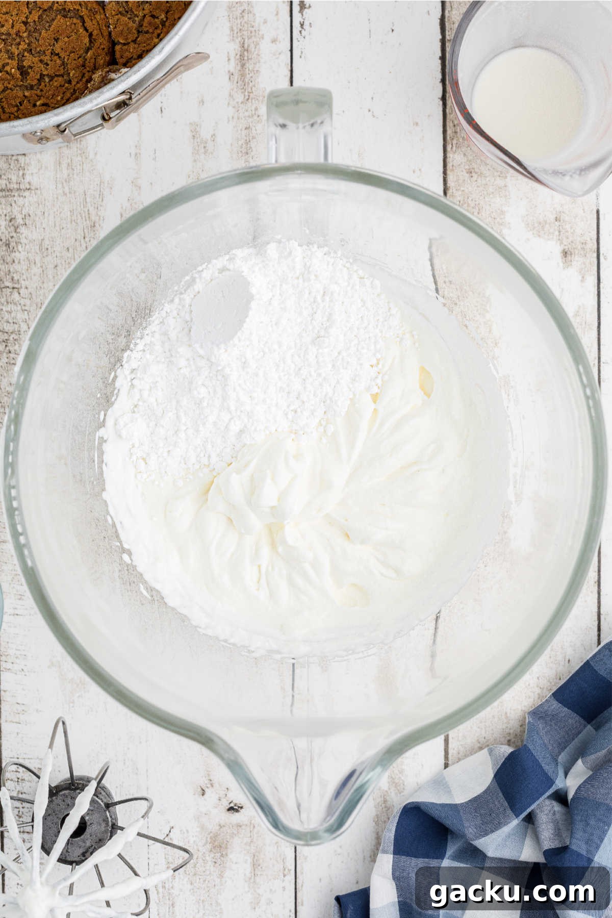 Powdered sugar in a large mixing bowl.
