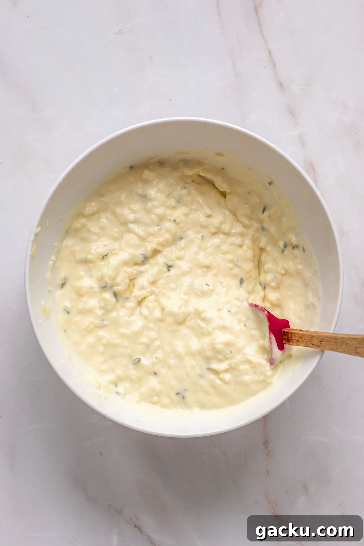 Mini Cheese Tartlets Recipe: Crispy Crusts with Creamy Filling 5 Pulverized cheese filling in a bowl.