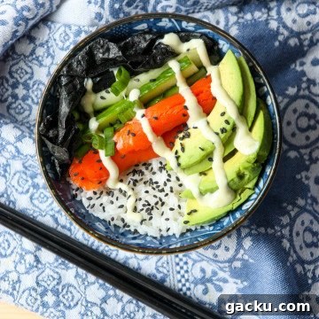 Salmon Chirashi Sushi Bowl Recipe: Easy Homemade Salmon Donburi 5 A bowl of food with avocado