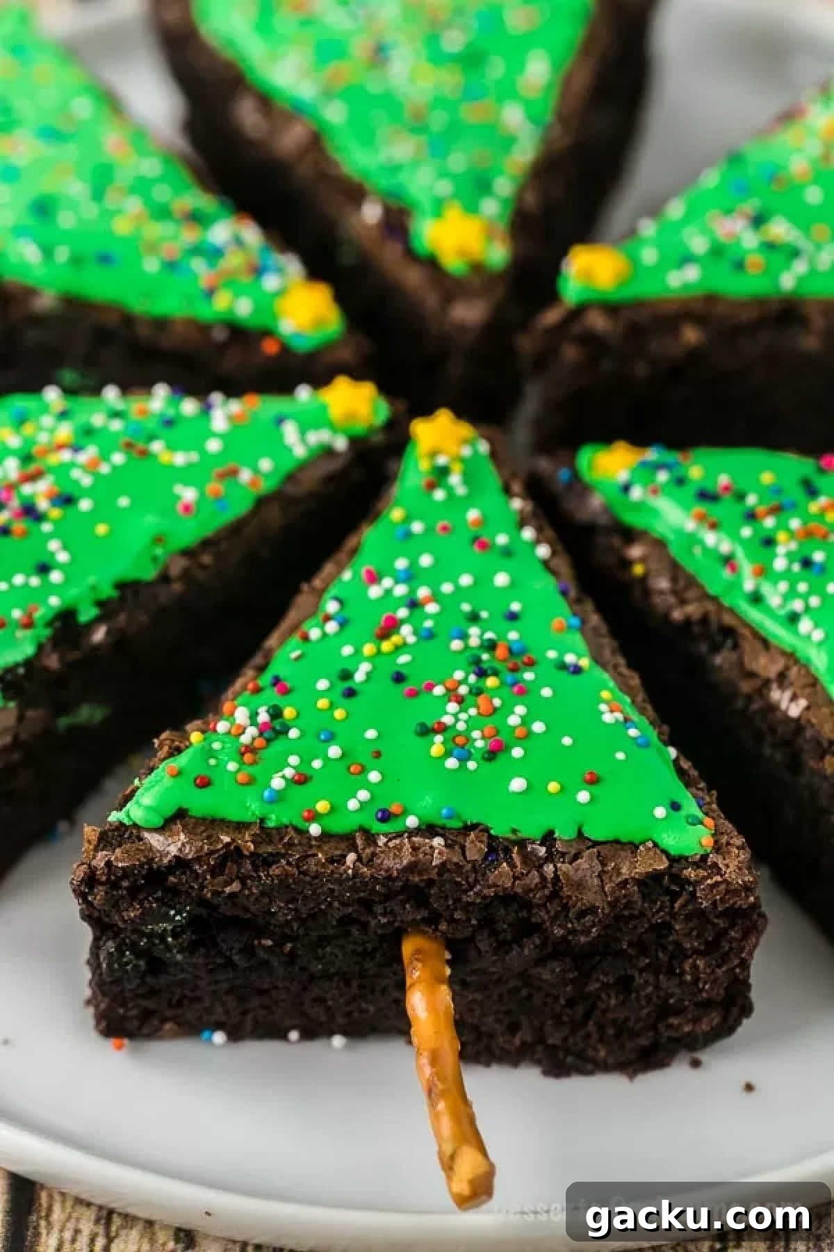 Christmas Tree Brownie Recipe: Festive Layered Chocolate Treat 8 Christmas tree brownies on a platter.