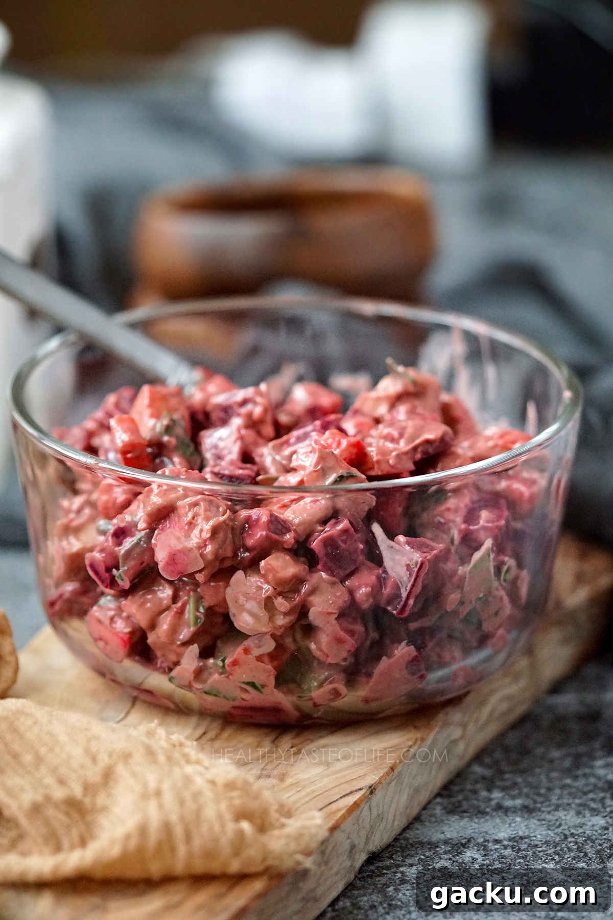 Picture showing how to store the Chicken Beet Salad leftovers in a container in the fridge.