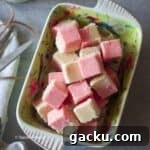 cropped up image of coconut squares for recipe card