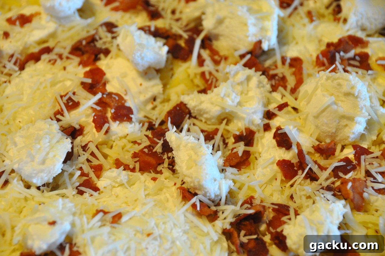 Cheese and bacon pizza before baking
