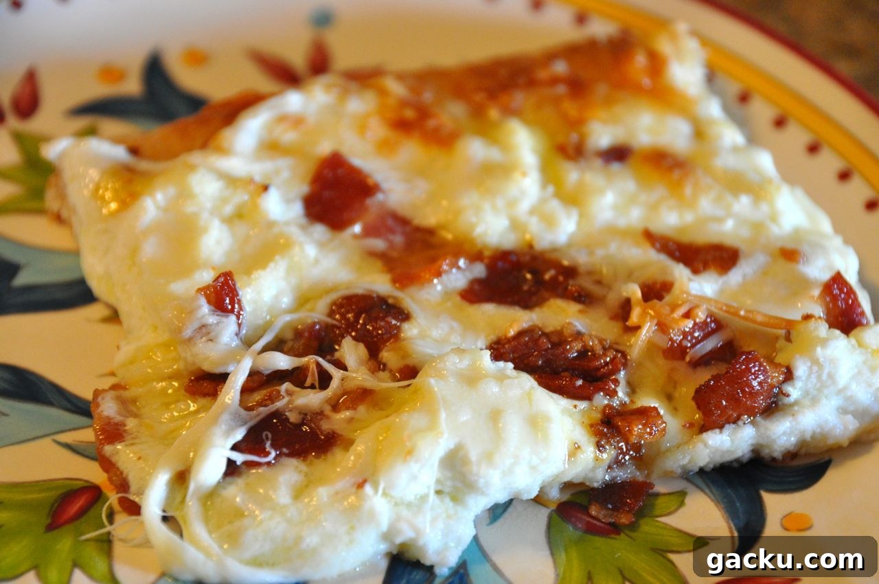 slice of cheese and bacon pizza