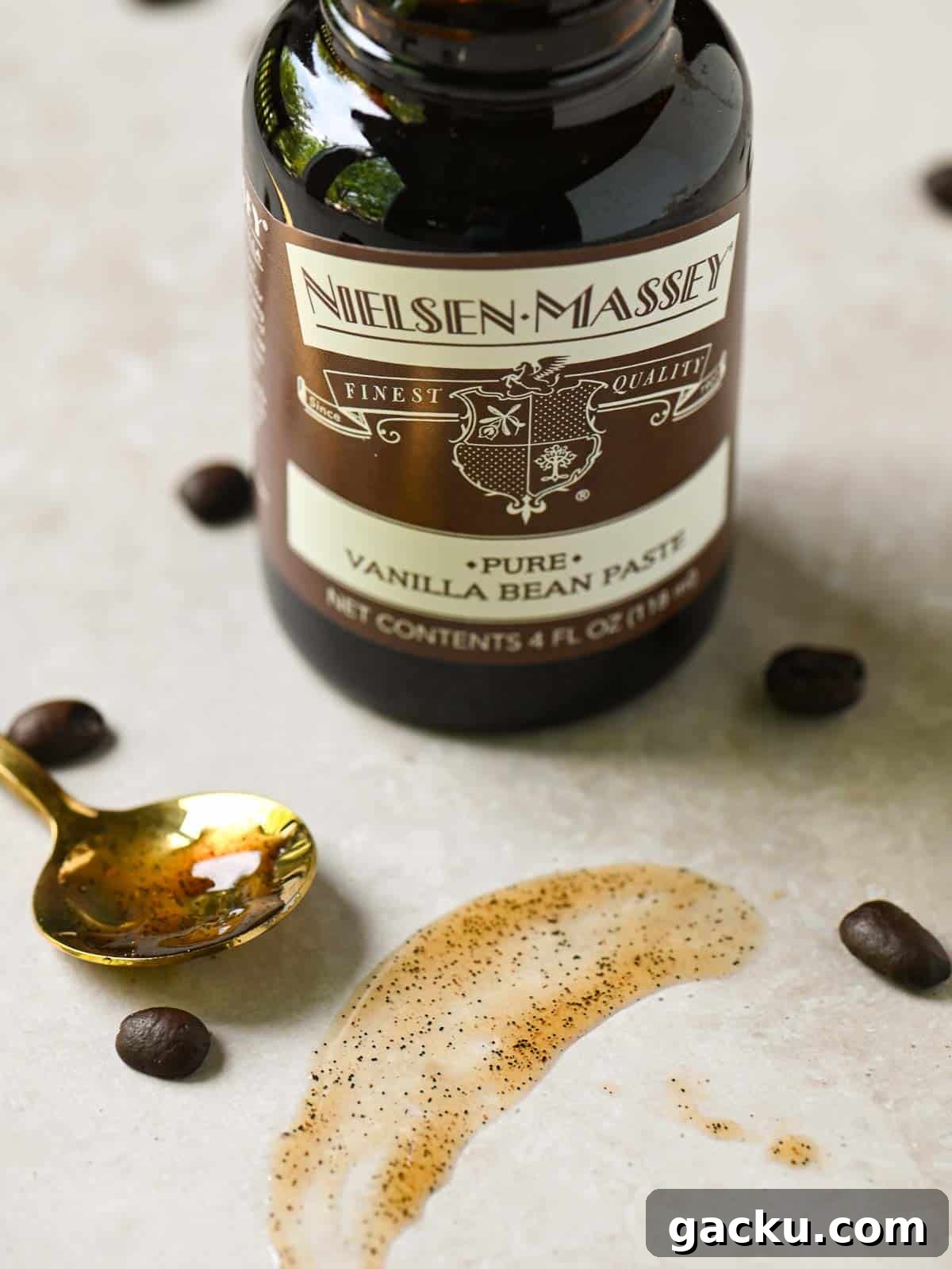 A smear of vanilla bean paste showing the golden bean flecks.