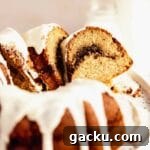 cutting slices of cinnamon bundt cake