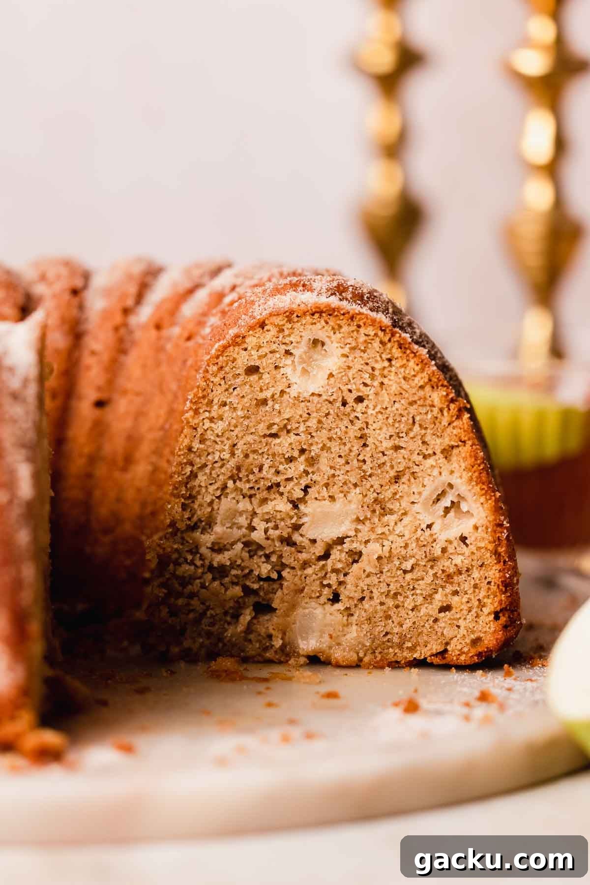 apple cider donut cake on a plate cross-section