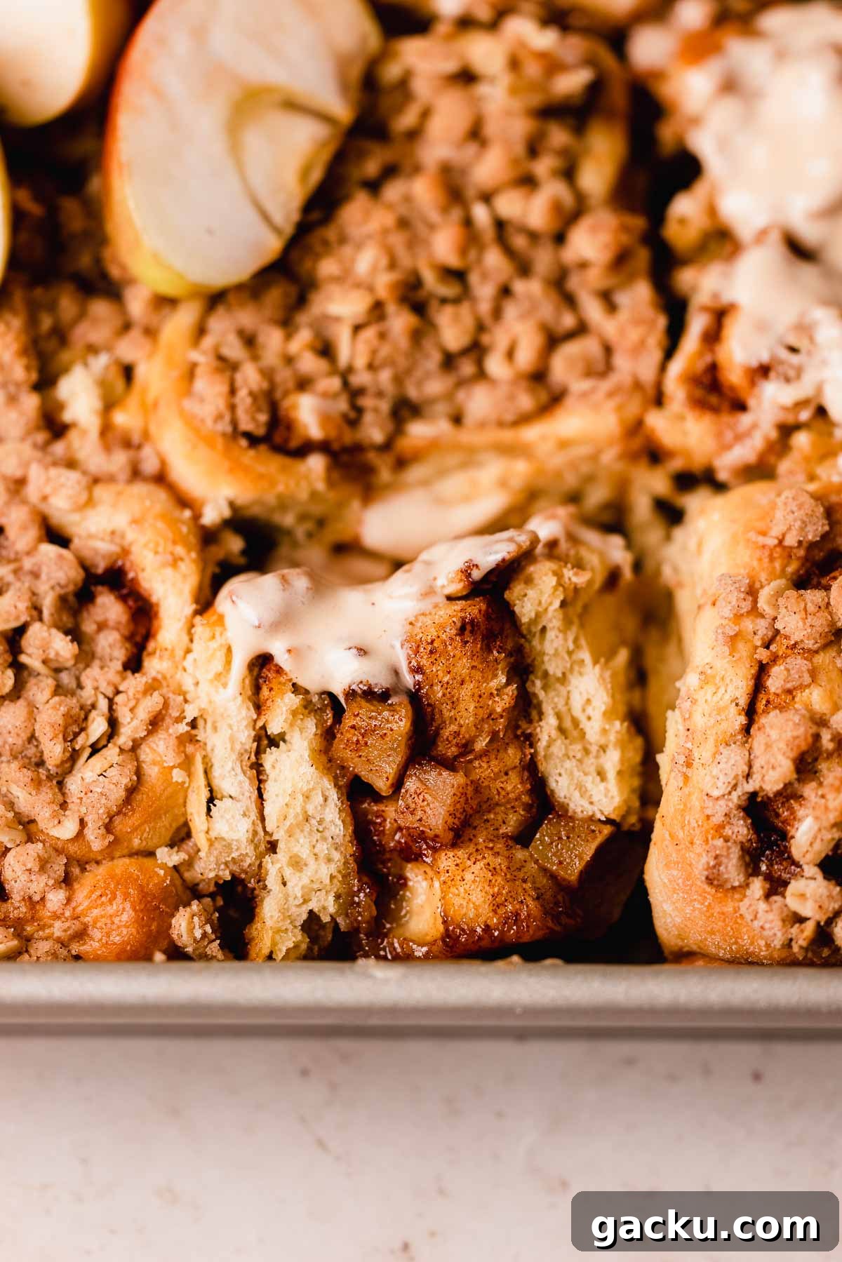 cross section of gooey apple cinnamon roll inside