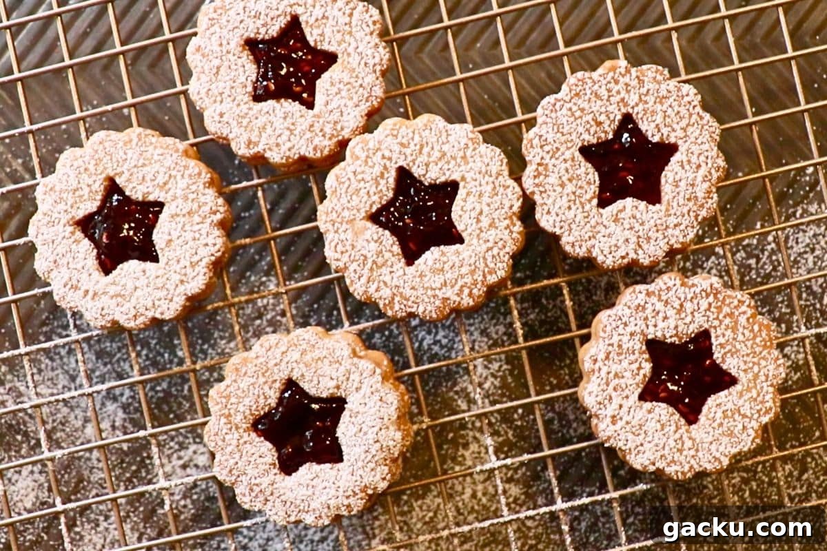 Linzer cookies on a wire rack
