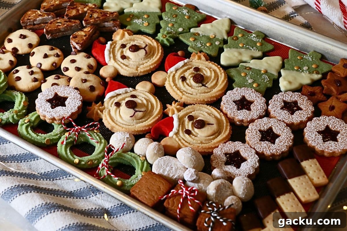 10 kinds of homemade Christmas cookies on a baking sheet