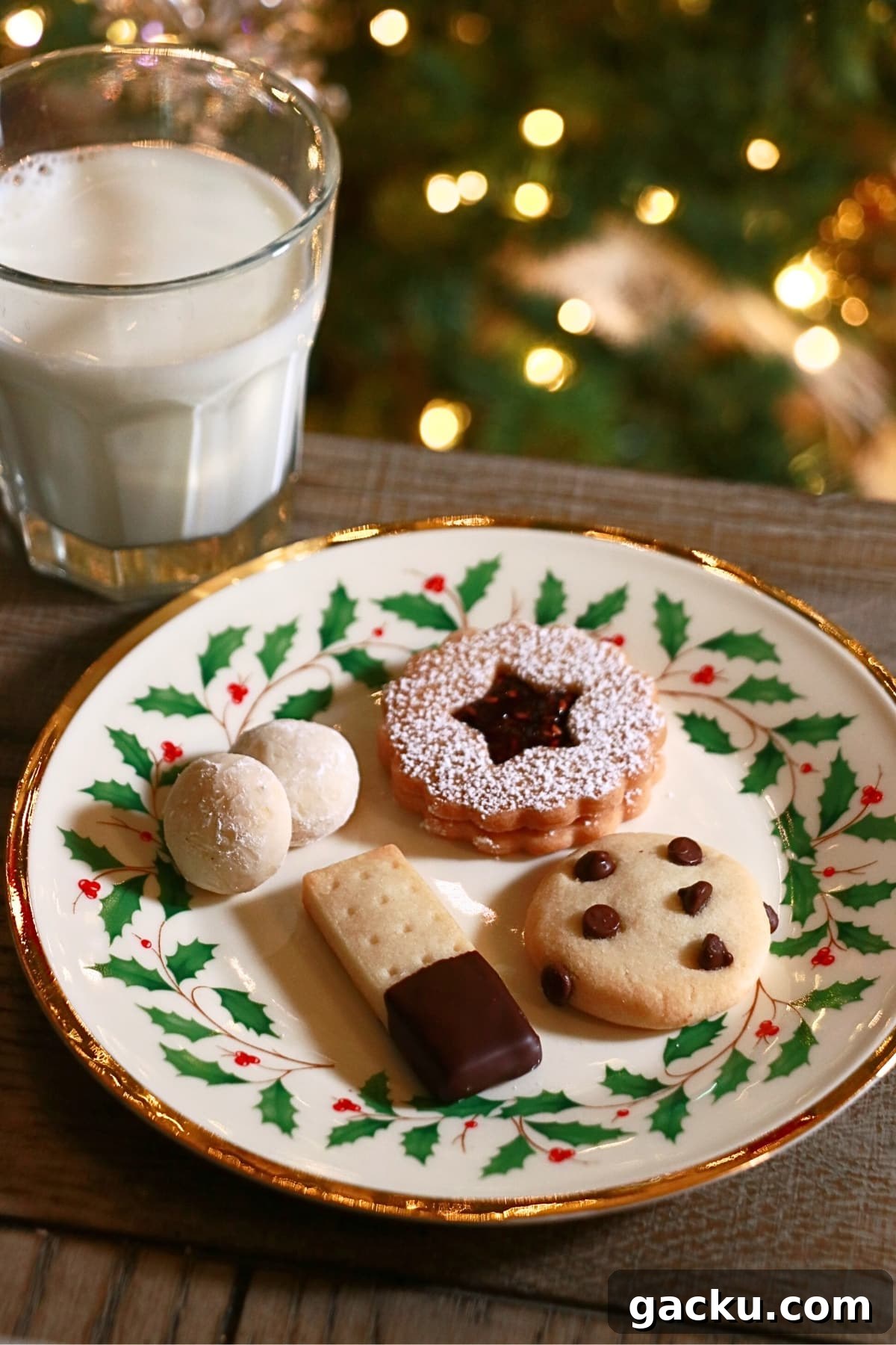 snowball, shortbread bar, mini chocolate chip, and linzer cookie on a plate
