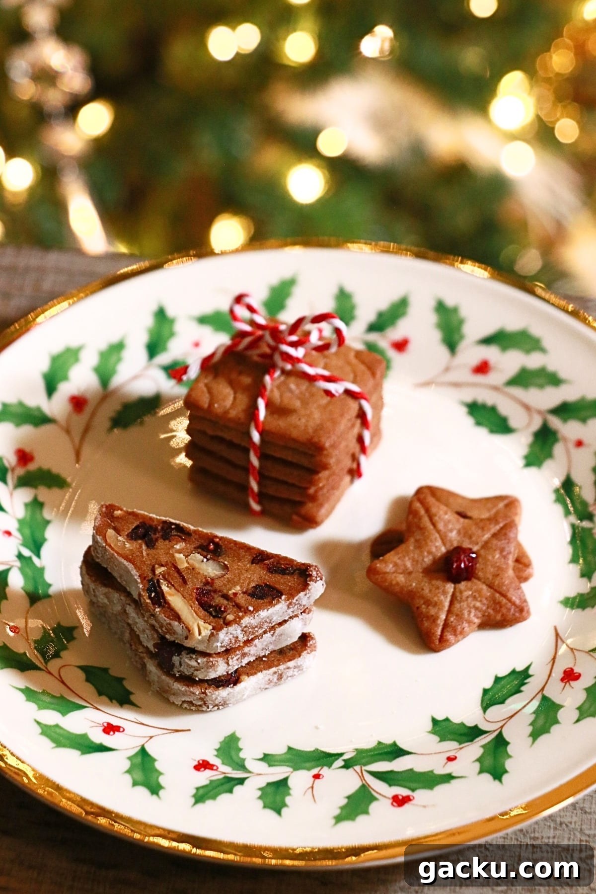 present box, stollen cookie, and star cookies on a plate