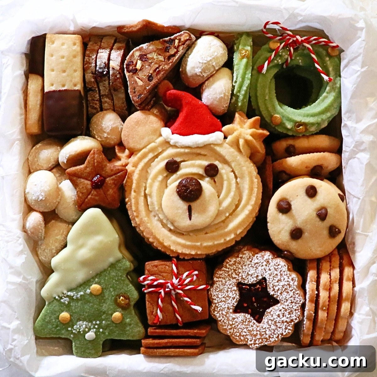 10 different kinds of festive christmas cookies in a cookie box