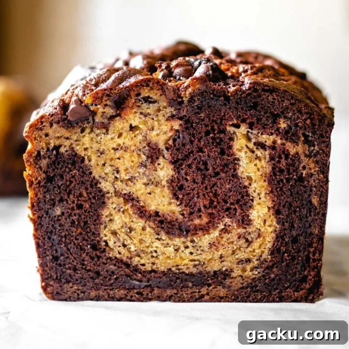 Slice of marbled chocolate banana bread.