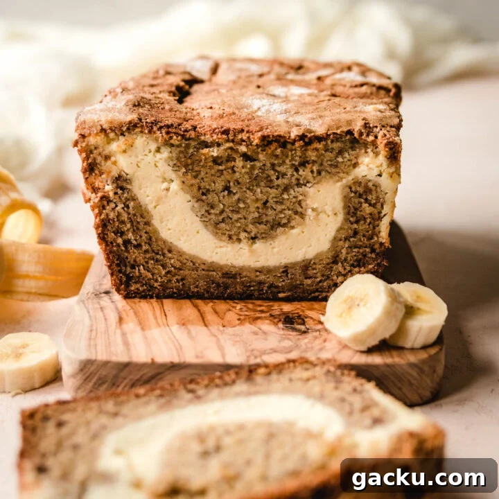 Banana bread filled with a swirl of cream cheese filling.