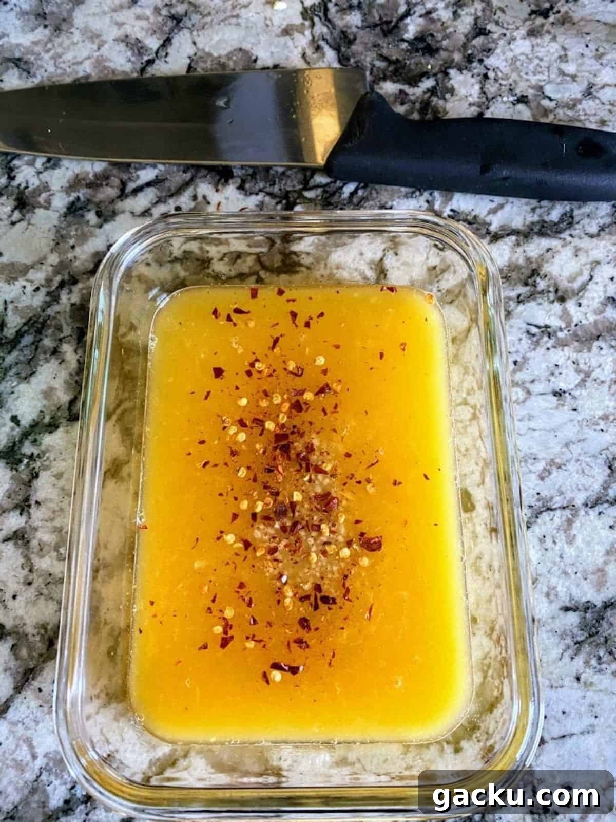 Citrus marinade in a container on the table. 