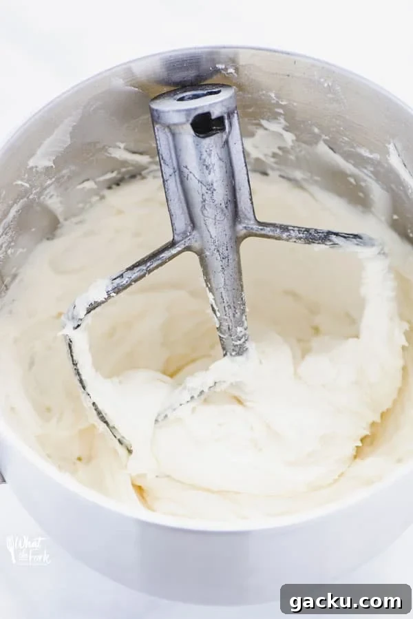 Cream Cheese Frosting Recipe: Smooth, Tangy, and Perfect for Cakes 5 This secret ingredient Cream Cheese Frosting recipe is the best one you’ll try!