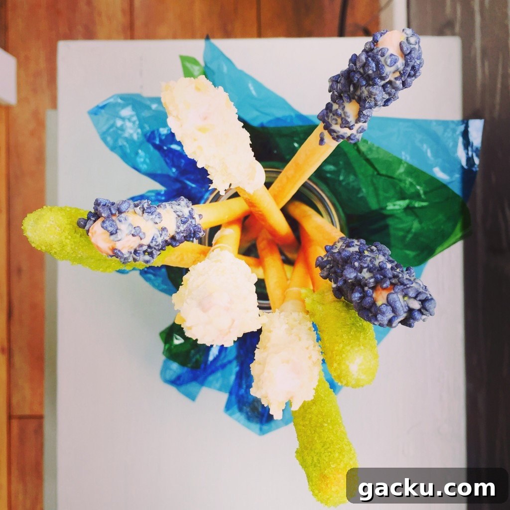 edible witches wands for halloween, halloween party food, easy halloween food ideas, halloween treats