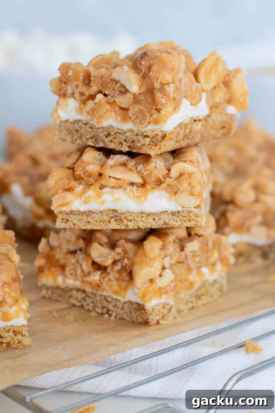 Salted Peanut Bar Recipe: Chewy No-Bake Snack Squares 2 stack of peanut bars on cooling rack