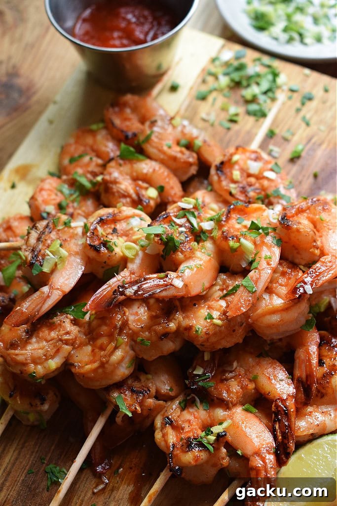 Zesty Lemon Skillet Shrimp Recipe — Quick Pan-Seared Shrimp 12 spiced shrmp on a board