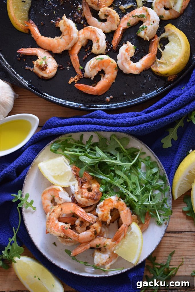 Zesty Lemon Skillet Shrimp Recipe — Quick Pan-Seared Shrimp 9 Lemon shrmip on a plate and in a skillet.