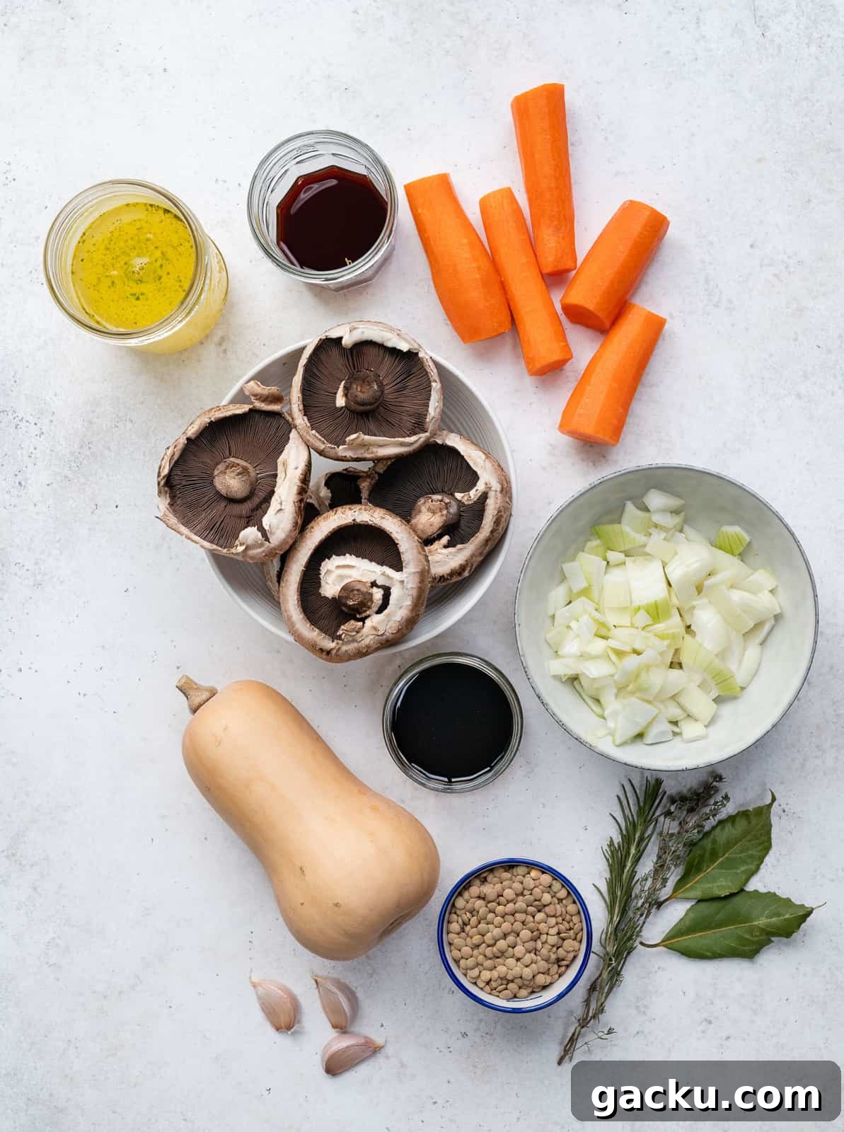 Comforting Vegan Lentil and Root Vegetable Stew 4 Ingredients for vegan stew against white background