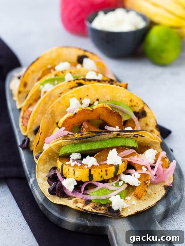 Delicata Squash & Black Bean Vegetarian Tacos for Fall Flavor 5 Front view of tacos.