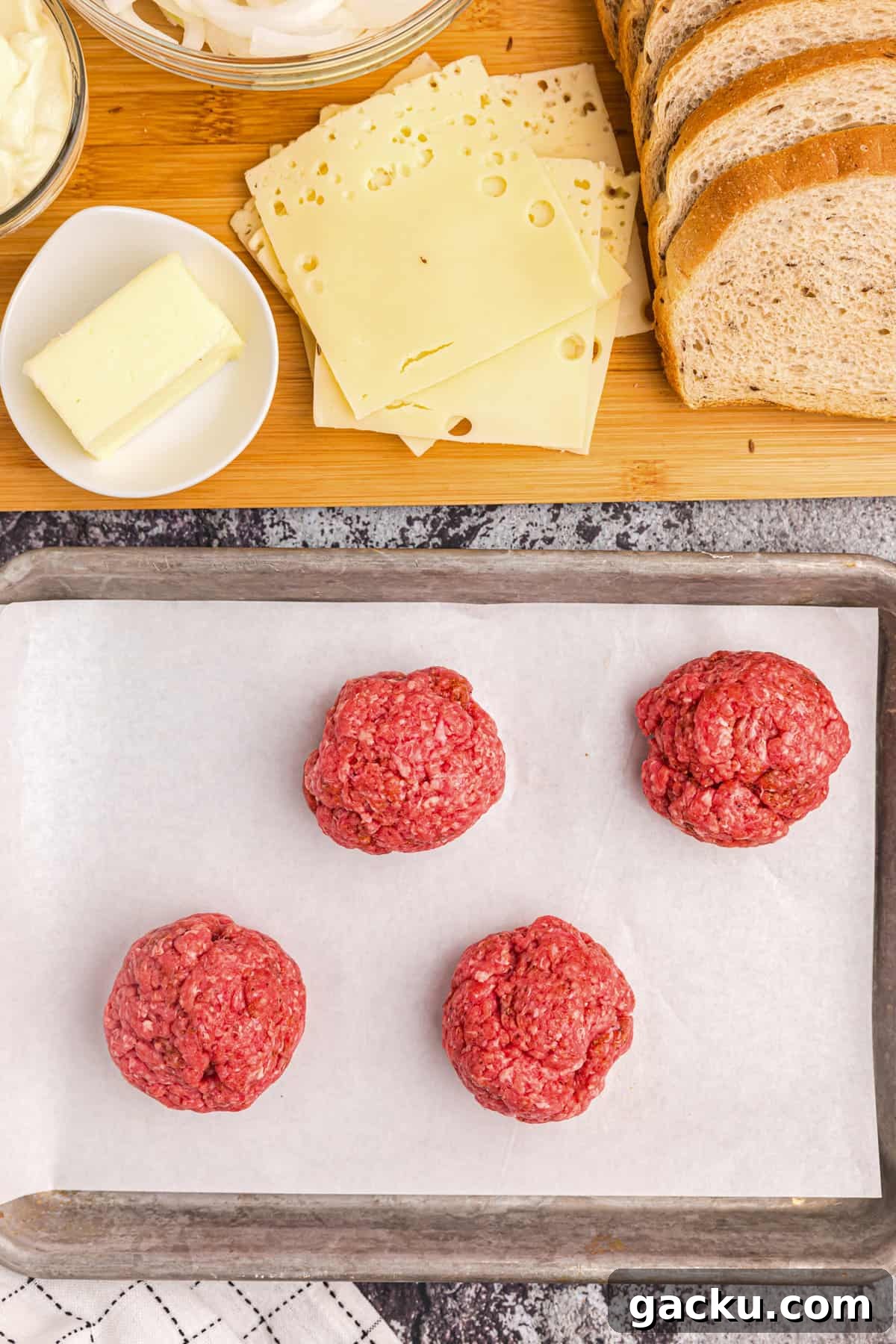 Perfect Blackstone Patty Melt Recipe: Juicy, Griddled Sandwich 5 Dividing seasoned ground beef into even balls for Blackstone Patty Melt