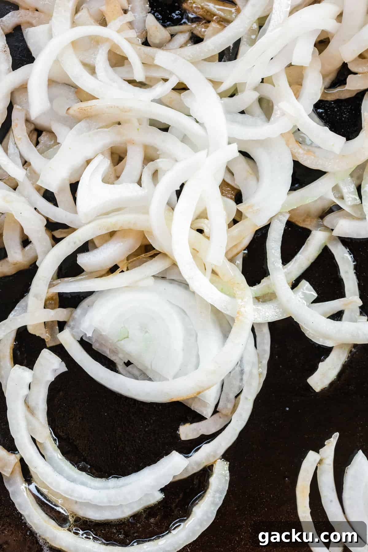 Perfect Blackstone Patty Melt Recipe: Juicy, Griddled Sandwich 8 Cooking onions in butter on Blackstone for Patty Melt recipe