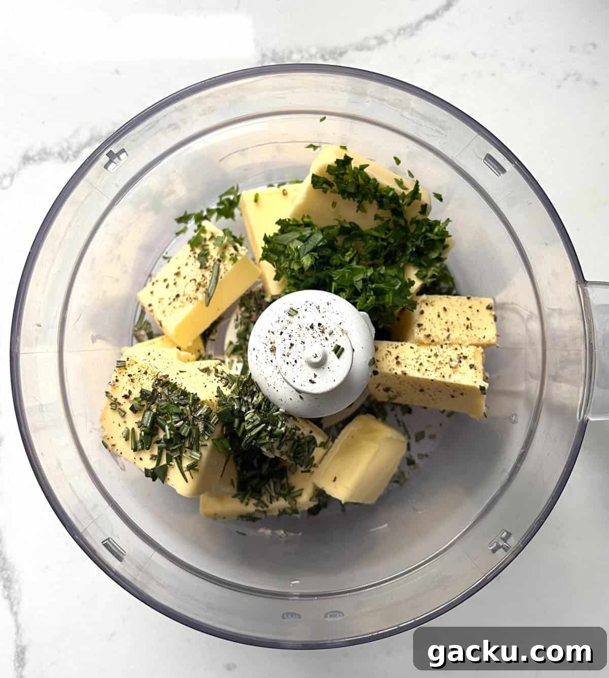 Roasted Garlic Butter Recipe for Homemade Bread, Steak & Veggies 5 Butter, herbs and pepper in a food processer.