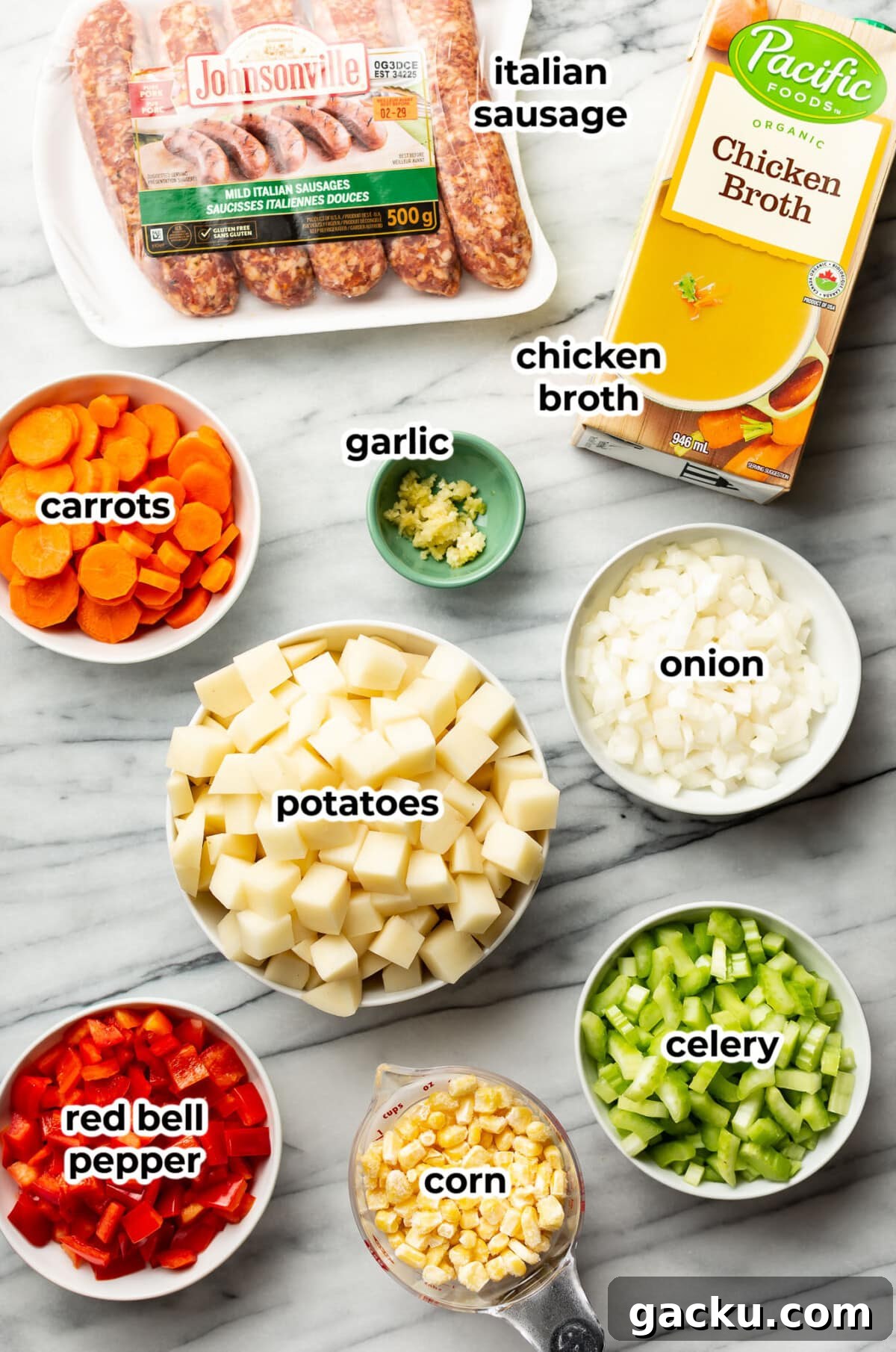 ingredients for sausage and vegetable soup in prep bowls