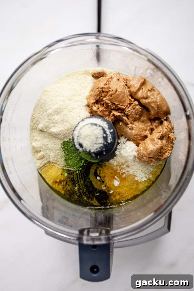 Energizing Matcha Energy Bites for Sustained Focus 3 almond flour, matcha, honey, coconut and cashew butter in a food processor