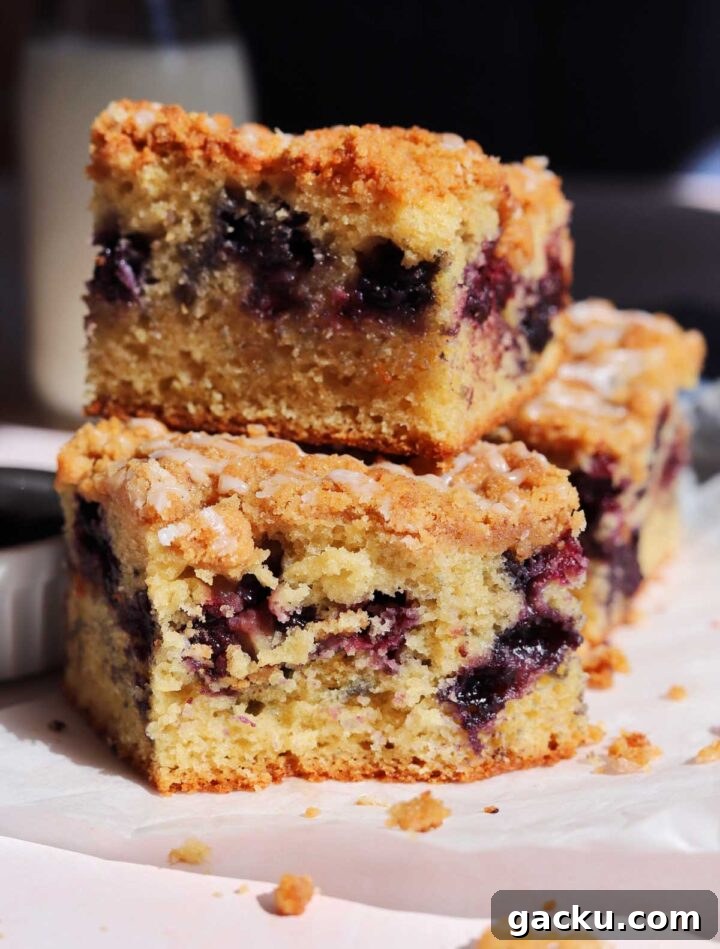 Blueberry Sour Cream Coffee Cake Recipe — Moist, Tender Slice 4 blueberry sour cream coffee cake stacked