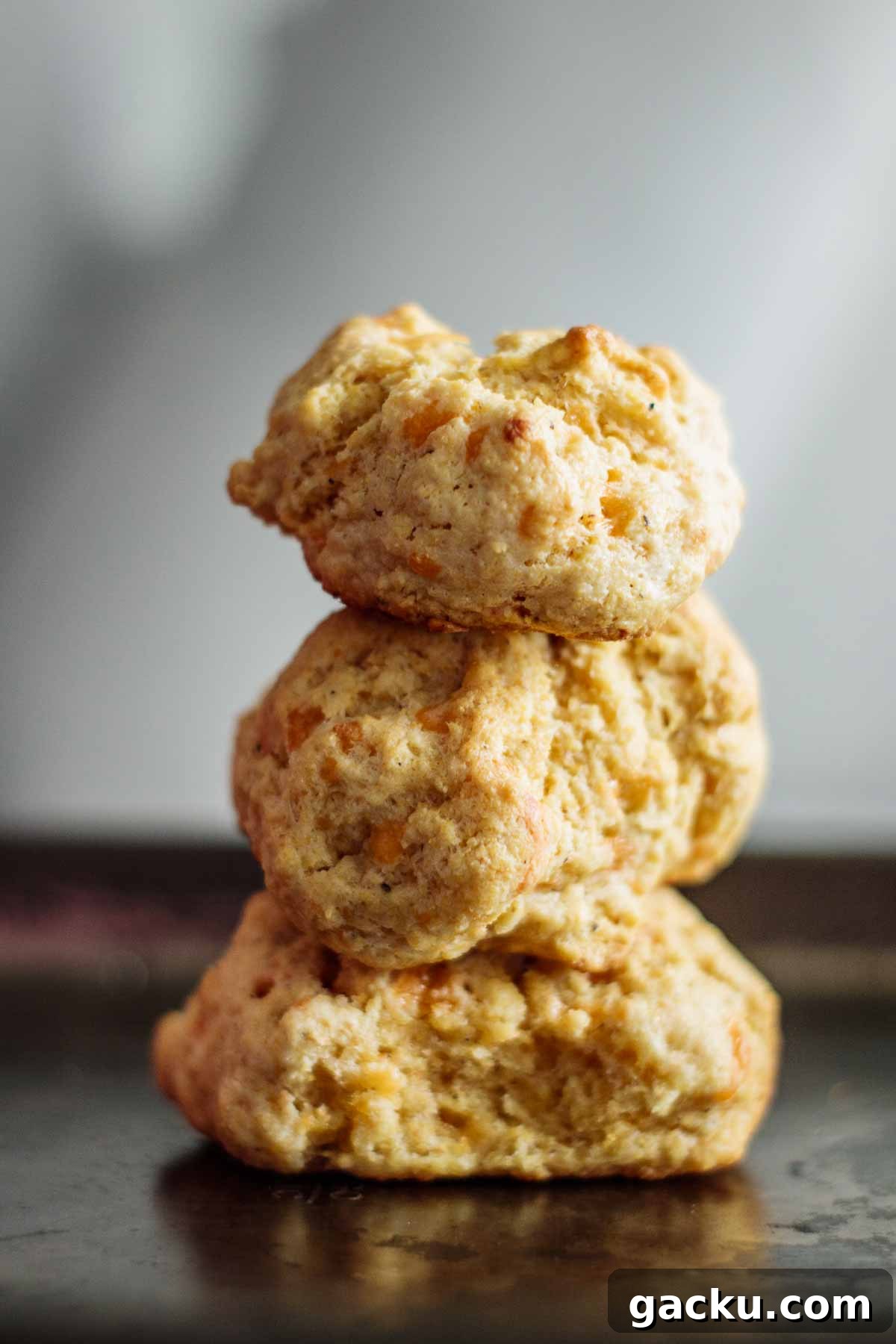 Cornmeal Drop Biscuits Without Buttermilk — Quick Southern Recipe 5 A stack of 3 cornmeal biscuits.