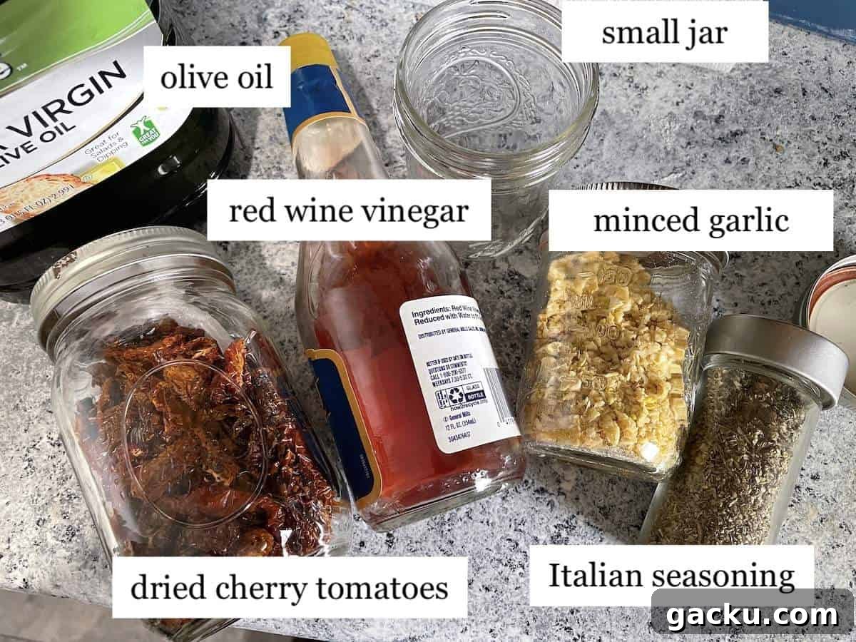 Dehydrating Cherry Tomatoes: Step-by-Step Guide for Perfect Results 10 The ingredients in sun dried tomatoes with garlic and oil, laid out and labeled.