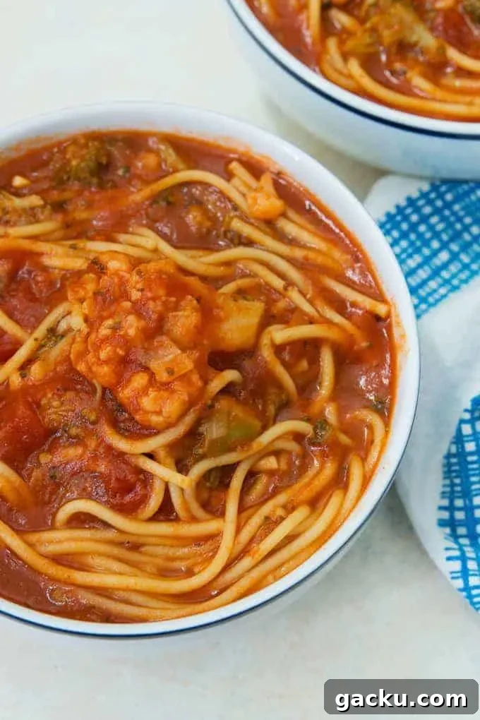 instant pot spaghetti soup in a white bowl