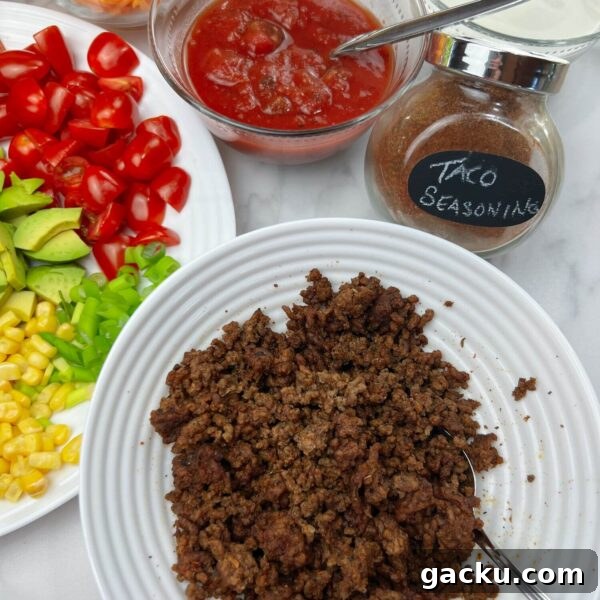 Weeknight Taco Salad: 20-Minute Recipe for Busy Evenings 3 taco salad toppings with close up of taco meat and seasoning in jar
