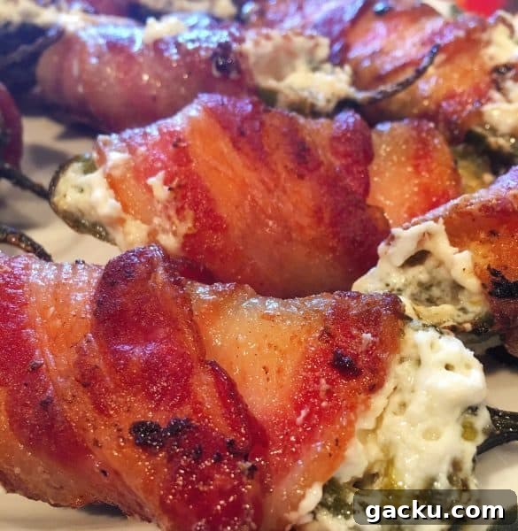 Cheesy Stuffed Jalapeños: Crispy Bacon-Wrapped Poppers Recipe 4 baked and grilled stuffed jalapeno peppers