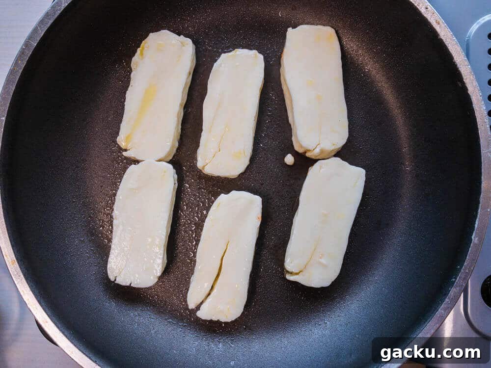 Halloumi Cheese in pan being fried