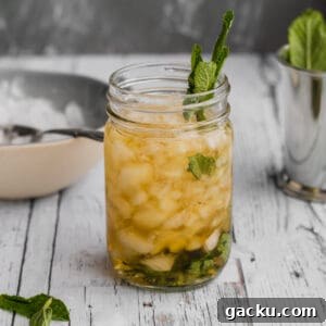 Classic Mint Julep Recipe: How to Make the Southern Cocktail 7 mint julep garnished with mint