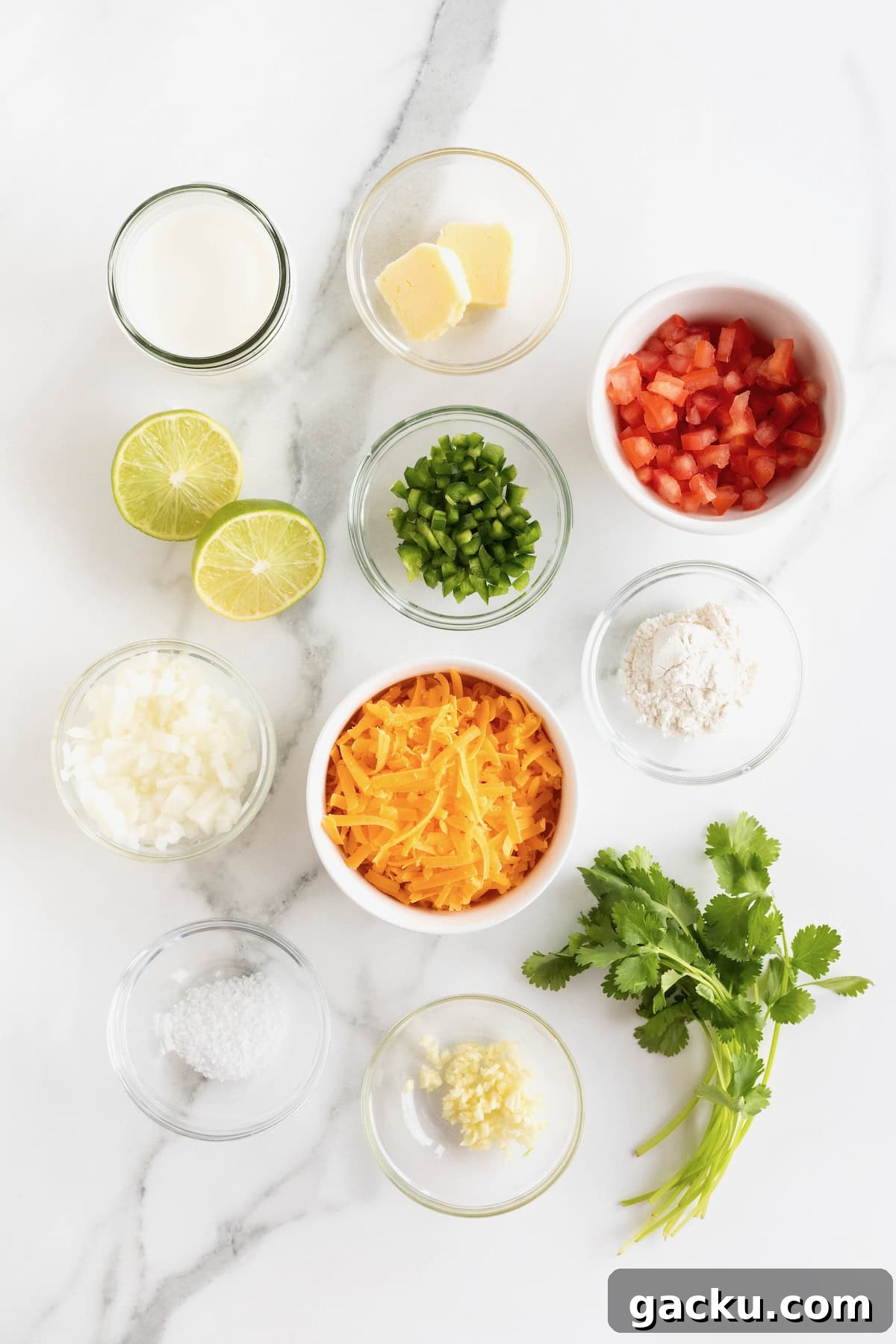 Stovetop Queso Recipe: Creamy, Quick Melted Cheese Dip 7 Ingredients to make queso in small glass dishes on a white marble counter.