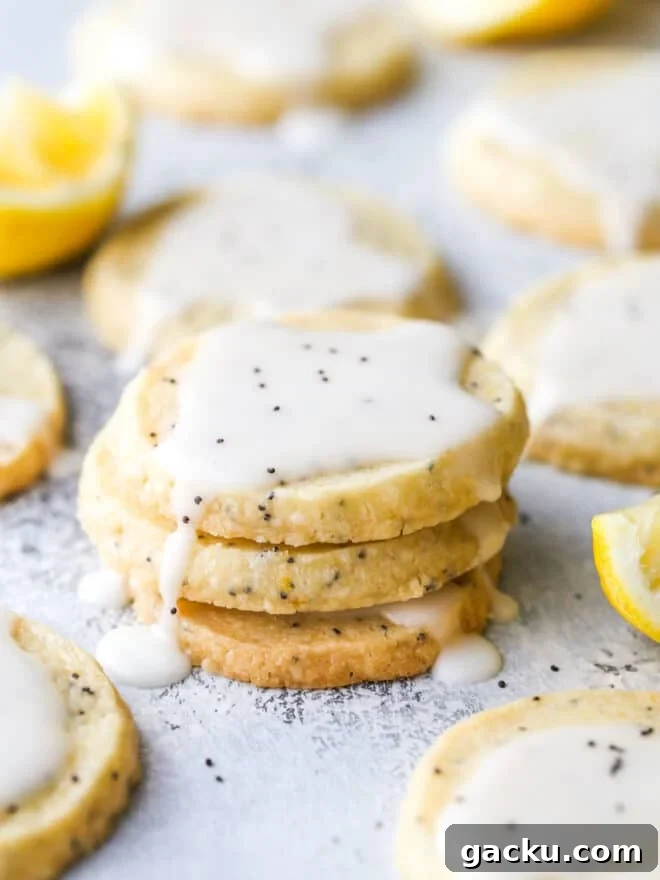 lemon poppy seed shortbread cookies stacked together