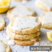 lemon poppy seed shortbread cookies stacked together
